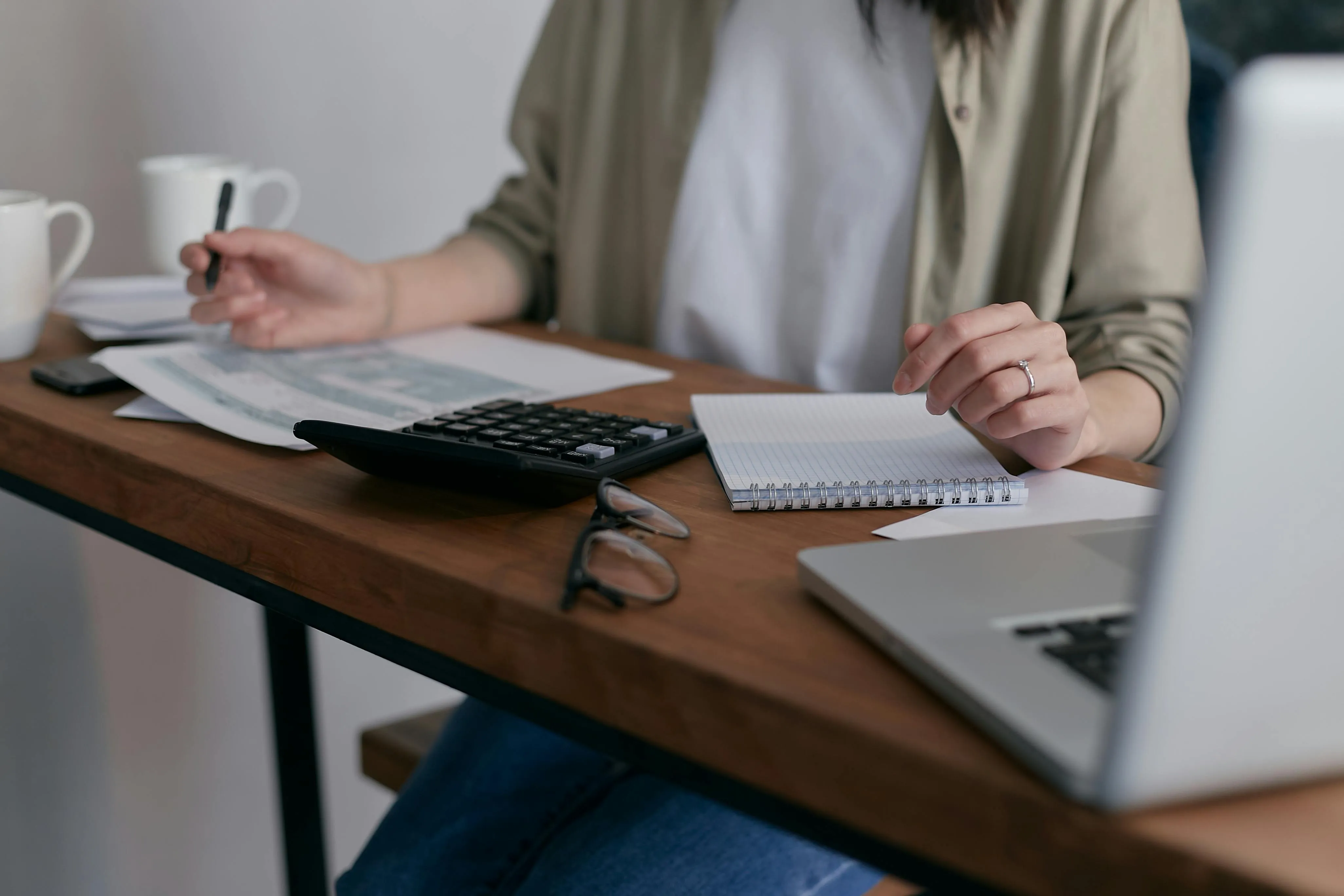 Person working at a desk studying